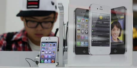 The iPhone 4S should be cheaper with the iPhone 5 in the shops on Friday. Photo / AP