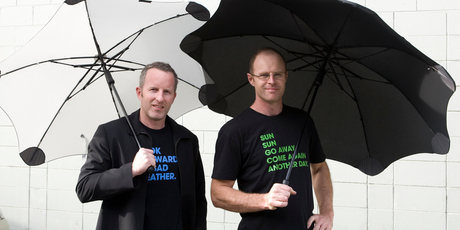 Madeblunt managing director, Scott Kington (left) and designer Greig Brebner with their Blunt umbrellas, made near Xiamen, China. Photo / NZ Herald