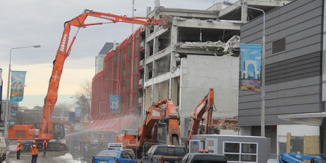 Demolition of a building on Lichfield Street near Colombo Street. Photo / Geoff Sloan