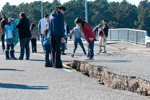 The earthquake damaged roadway on the South Brighton Bridge, Christchurch. Photo / NZPA