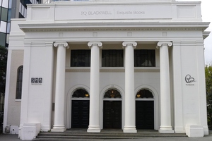 The facade of the 1933 building is echoed in the repurposed interior spaces.