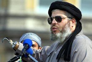 Radical muslim clerk Sheikh Abu Hamza gestures while addressing devotees at the 'Rally for Islam' at Trafalgar Square in central London. File Photo / AP
