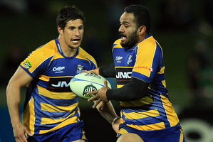 Lelia Masaga of Bay of Plenty runs the ball with Phil Burleigh in support. Photo / Getty Images