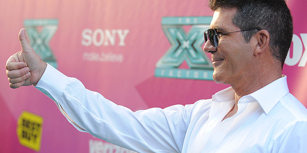 Simon Cowell is getting his house healed in his latest health kick. Photo / AP