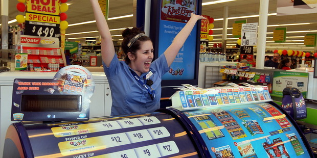 Jodie Pothoven, Lotto assistant at Countdown Carlyle, Napier, shows her delight after the store sold a winning $2 million first division Lotto ticket. Photo / Duncan Brown