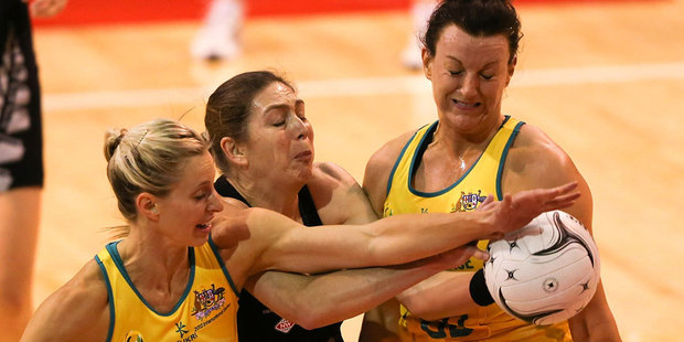 Irene van Dyk (C) of New Zealand fights for the ball during the Constellation Cup match between the New Zealand Silver Ferns and the Australian Diamonds. Photo / Getty Images.