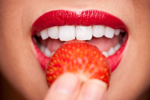 Strawberries not only pack a nutritional punch, they can also be used to brighten up that smile. Photo / Thinkstock