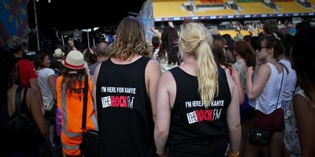 At its deathbed, those loyal supporters turned out, garbed in 'I'm here for Kanye: Yeah Right' Tui parodies. Photo / Milana Radojcic At its deathbed, those loyal supporters turned out, garbed in 'I'm here for Kanye: Yeah Right' Tui parodies. Photo / Milana Radojcic