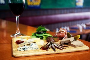 La Cantine's mixed board selection of French cheeses, charcuterie and gherkins. Photo / Sarah Ivey