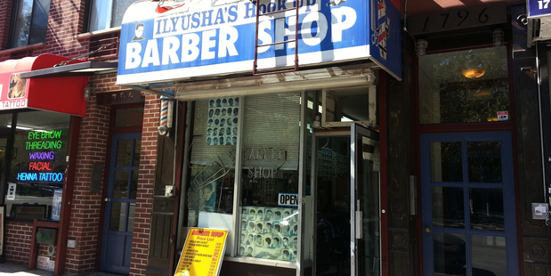 Ilyusha's Barber Shop in Harlem, New York. Photo / Jack Tame