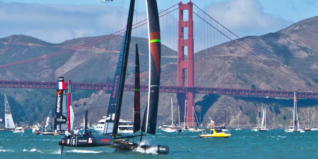 Oracle Team USA puts on a show as spectators enjoy the event. Photo / Alex Robertson