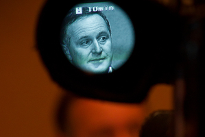 John Key says Kim Dotcom's image flashed up briefly. Photo / Greg Bowker