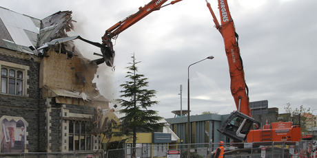 Demolition of the earthquake damaged Cranmer Courts. Photo / Geoff Sloan