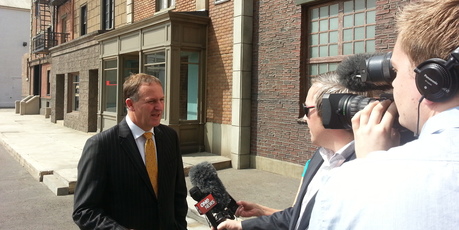 John Key talks to media during his visit to Hollywood. Photo / Jack Tame