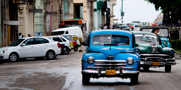 Well-preserved cars from the 1950s are a feature of Havana streets, where Cuban revolutionary leader Fidel Castro remains a significant figure. Photo / Bloomberg