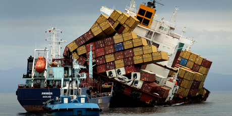 The container ship MV Rena pictured where it struck the Astrolabe Reef off the coast of Tauranga. Photo / Alan Gibson