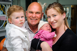 Rodney Hide with his wife Louise, daughter Liberty and new born baby girl Grace at Wellington Hospital. Photo / Mark Coote
