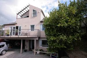 5/491 Whangaparaoa Rd is one of the homes up for forced mortgagee sale. Photo / Trade Me