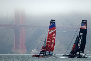 Team NZ, left, and Oracle Team USA practice on San Francisco Bay Photo / AP