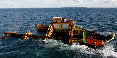 The engineering nightmare that is the salvage of the wrecked MV Rena hasn't become any easier in the months since the container ship slammed into the Astrolabe Reef off the Tauranga coastline on this date last year. Photo / Christine Cornege