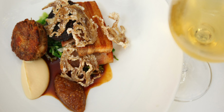 The 'plate of pig' with savoy cabbage and turnip cream. Photo / Chris Gorman