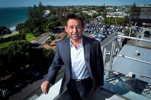 Takapuna resident John Copson plans a multi-storey retail and apartment block extending 100m back from Hurstmere Rd to present a big glassy face to the beach and the public reserve. Photo / Natalie Slade