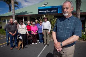 Laurie Webb was pleased to hear the announcement by Len Brown (left) that the library will stay open. Photo / Natalie Slade