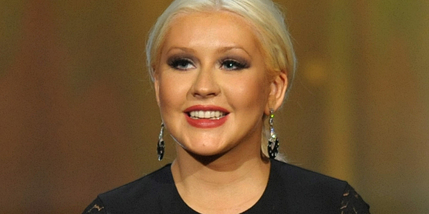 Quotes about being a 'fat girl' attributed to Christina Aguilera were made up, the singer's reps say. Photo / AP