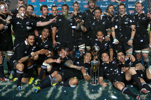 The All Blacks celebrate after winning the inaugural Rugby Chamionship after their victory in the Rugby Championship match between Argentina and the New Zealand. Photo / Getty Images.