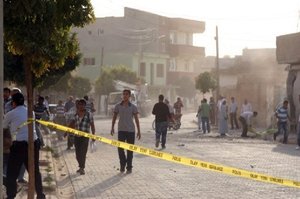 The explosion area is pictured after several Syrian shells crashed inside Akcakale town in Turkey, killing at least five people. Photo / AFP