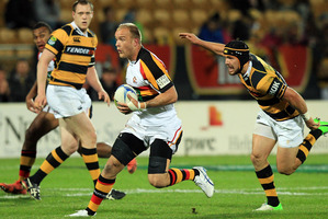 Matt Vant Leven of Waikato evades the tackle of Jayden Hayward of Taranaki. Photo / Getty Images