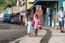 Girls wearing their Sunday best, heading to Scared Heart church. Photo / Kelly Lynch