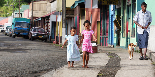 Girls wearing their Sunday best, heading to Scared Heart church. Photo / Kelly Lynch
