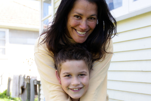 Manaaki Ropiha with mother Kara at home in Auckland. Photo / Doug Sherring