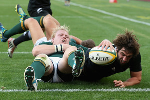 Sam Whitelock dives over the line for a try in the All Blacks' 32-16 win over the Springboks. Photo / Getty Images