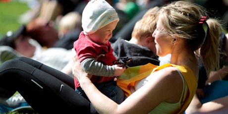 Mum Rachel Grunwell sweats it out at boot camp while son Finn supervises. Photo / Michael Craig