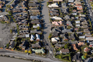 Aerial view of liquefaction and earthquake damaged houses in Burwood, Christchurch. Photo / Geoff Sloan.