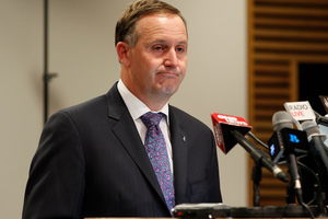 Prime Minister John Key doesn't think much of the Greens' plan to lower the dollar by printing more money. Photo / NZ Herald