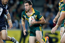 Australian Cameron Smith makes a break against New Zealand's during a rugby league Four Nations tournament, Eden Park, Auckland.Photo / AP 