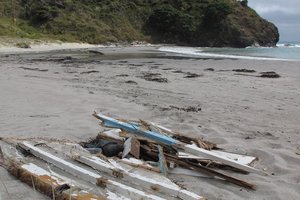 Wreckage of the yacht Boadicea washed up at Tapotupotu Bay, near Cape Reinga. File photo / Peter de Graaf