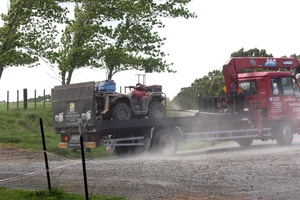 A truck removes a quad bike from a farm when a 10-year-old boy died today. Photo / APNZ