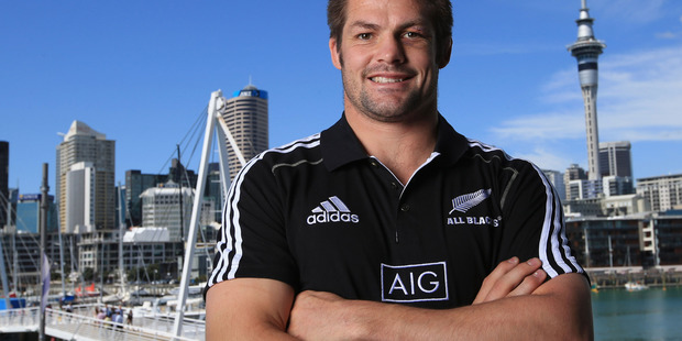 All Black captain Richie McCaw holds up the new All Black jersey. Photo / Getty Images