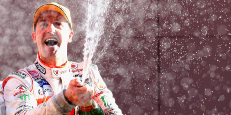 Jamie Whincup celebrates on the Bathurst podium yesterday afternoon. Photo / Getty Images