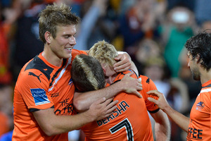 Besart Berisha and Mitchell Nichols of the Roar celebrate a goal during the round 2 A-League match between Brisbane Roar and Melbourne Victory. Photo / Getty Images
