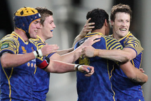 Otago captain Glenn Dickson, Jackson Hemopo, Michael Collins and Hugh Blake celebrate their victory over Tasman. Photo / Getty Images