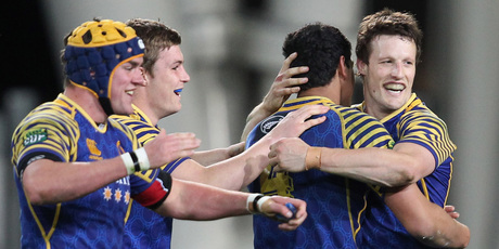 Otago captain Glenn Dickson, Jackson Hemopo, Michael Collins and Hugh Blake celebrate their victory over Tasman. Photo / Getty Images