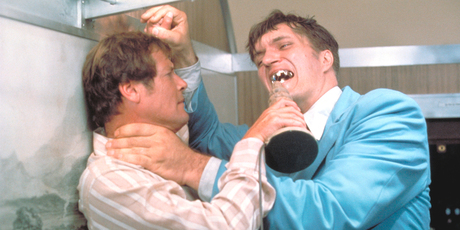 Roger Moore, left, as James Bond in a scene from The Spy Who Loved Me. Photo / AP