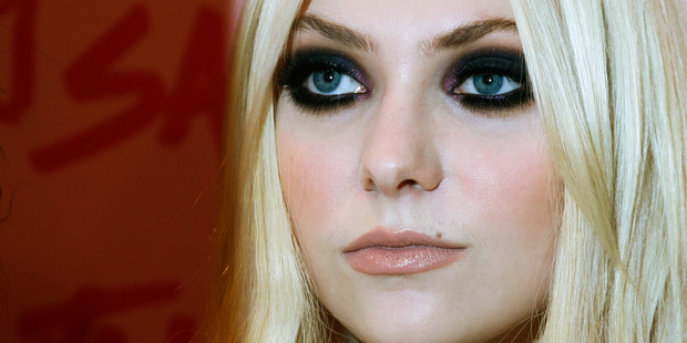 Taylor Momsen appears nude in a new video for Under the Water. Photo / AP