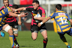 Ryan Crotty of Canterbury breaks through tackles during the round 15 ITM Cup match between Canterbury and Bay of Plenty. Photo / Getty Images.