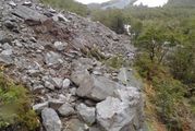 This large slip blocked the road to Milford Sound in Fiordland. Photo / Supplied